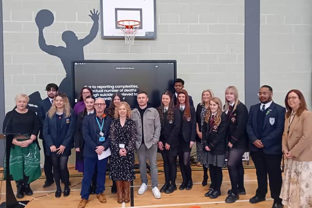 Carl Frampton with pupils from St. Patrick's Academy, Lisnagarvey High School, St. Colm's High School and Malone Integrated College, Nicola Topping EA, Pat Carville EA, Jim Weir EA, CF, Roisin Clarke VP of St. Patrick's Academy, Grainne McCann Principal of St. Patrick's Academy. Pic credit: Education Authority
