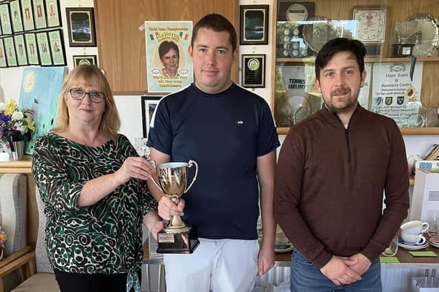 Following success in the Fermanagh Masters Open in Irvinestown, Paul McCrum (centre) is presented with the trophy by Councillor Debbie Coyle, chair of Fermanagh and Omagh District Council's Environmental Services Committee, included is finalist Matthew Ryan. Photo provided by Paul McCrum
