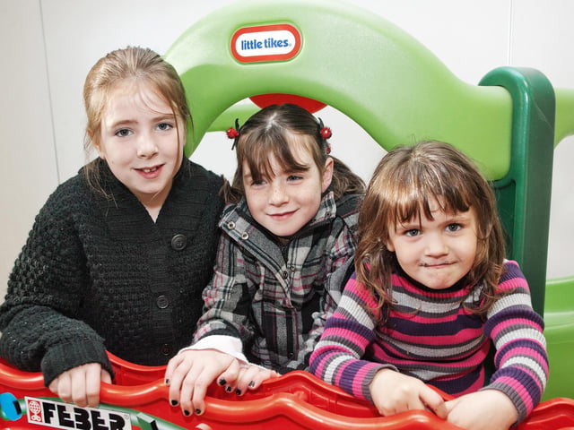 Little Shauna, Emma and Amy Hunter smile for the camera at Armoy Playgroup Halloween Coffee Morning in 2010.