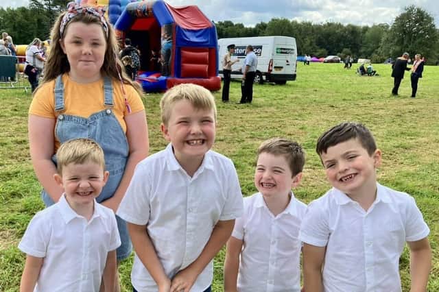 Lucy Johnson, Kaine James, Daniel and Braxton Bagnall-Johnson enjoy the brief sunshine in the field at Ballinderry during the Twelfth of July celebrations. What a lovely photo! Contributed image via Ulster Star Facebook
