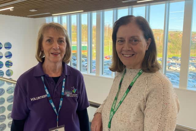 Margaret McCormack and Shirley Johnston share their story of volunteering at the Macmillan Cancer unit at the Ulster Hospital. Pic credit: SEHSCT