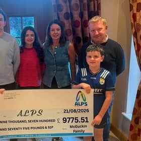 Members of McGucken family with representatives from Auto Car Wash pictured handing over a cheque for £9,775.51 to ALPS who continue its vital work supporting people experiencing mental health difficulties and families impacted by suicide. Credit: Supplied