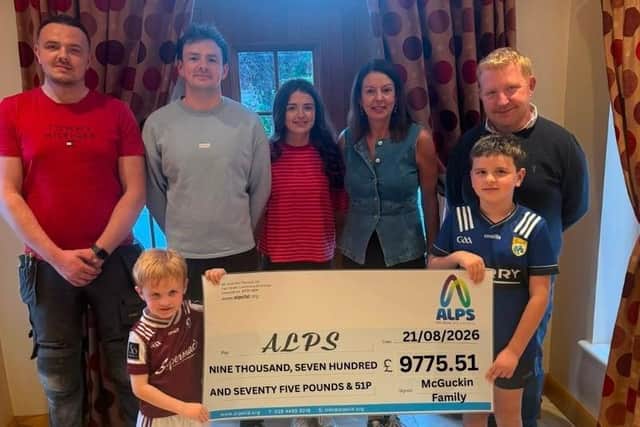 Members of McGucken family with representatives from Auto Car Wash pictured handing over a cheque for £9,775.51 to ALPS who continue its vital work supporting people experiencing mental health difficulties and families impacted by suicide. Credit: Supplied