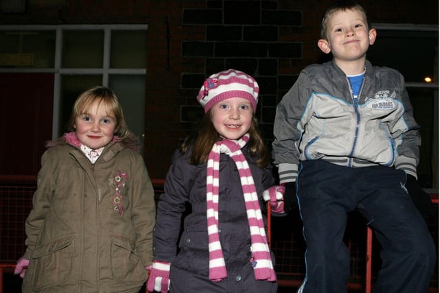 Awaiting the switching on of Whitehead's lights in 2007 were Aimee McClenaghan, Leah Cuthbert and Jamie Flynn. Ct49-047tc