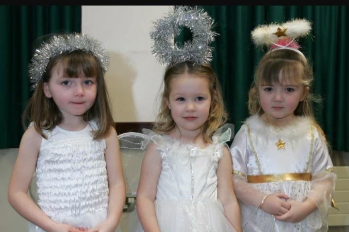 Playing angels in Woodburn Playgroup's Nativity in 2006 were Rachel Shannon, Olivia Starrett and Lucy McMath.