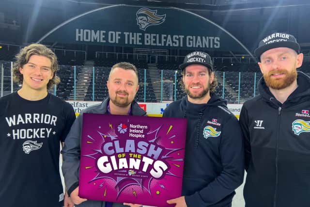 Belfast Giants players Matt McLeod, Grant Cooper and Ciaran Long with Niall Coleman, NI Hospice Communications Manager.