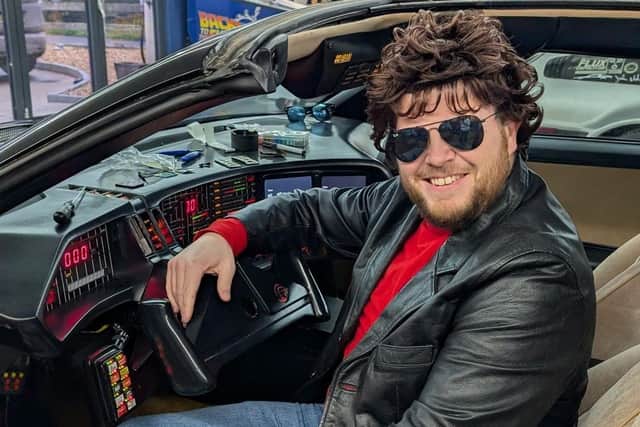 Davy Abraham doing his best impression of actor David Hasselhoff, the actor who drove the car in the Knight Rider TV series.
