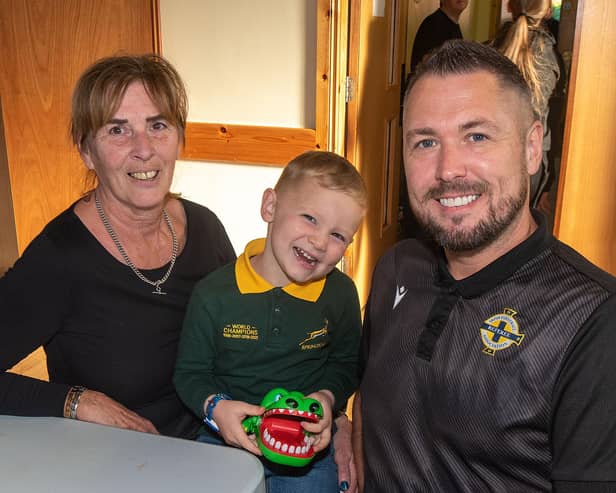 Three generations of the Sinton family who attended the Mavemacullen Accordion Band big breakfast. Included are from left, Amanda, grandson Caleb (3) and son, Neil.