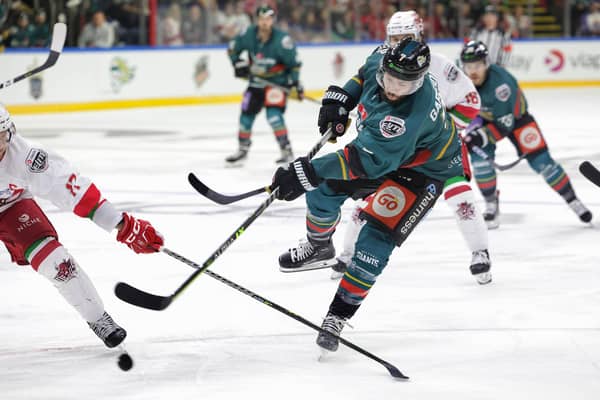 Belfast Giants’ Mark Garside with Cardiff Devils’ Sam Duggan during Sunday’s Elite Ice Hockey League Playoff Final at the Motorpoint Arena, Nottingham.     Photo by William Cherry/Presseye