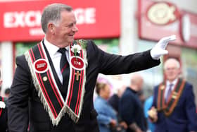 Spotting a friend during the parade in Bangor on Saturday.