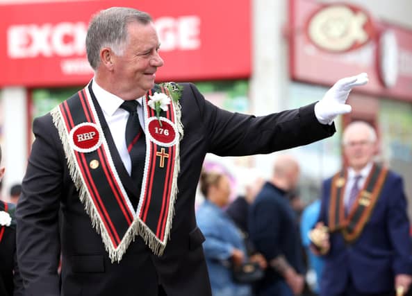 Spotting a friend during the parade in Bangor on Saturday.