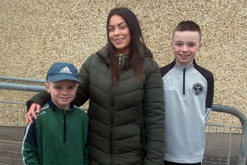 Kerrie McGibbon pictured with her sons, Ethan (7) and Jake (10) at the St Peter's GAC St Patrick's Day parade and fun day. LM11-201.