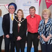 Mid Ulster Council chair Cora Corry with Mid Ulster Volunteer Centre members - Josie McGuckin (committee member), Michele McKeown (general manager) and May Devlin Chair with Gary Wilson Compere and Kenny Paul, who provided the entertainment.

