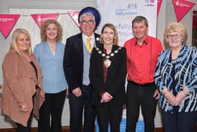 Mid Ulster Council chair Cora Corry with Mid Ulster Volunteer Centre members - Josie McGuckin (committee member), Michele McKeown (general manager) and May Devlin Chair with Gary Wilson Compere and Kenny Paul, who provided the entertainment.

