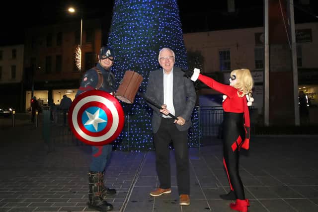 Pictured l to r are Captain America with Alderman Allan Ewart MBE Development Committee Chairman at Lisburn & Castlereagh City Council and Harley Quinn