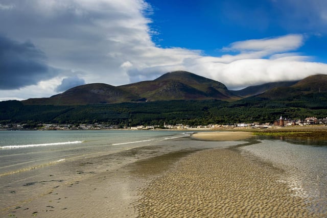 Newcastle Beach and the surrounding area is within the Mournes and Slieve Croob Area of Outstanding Beauty and the Murlough Special Area for Conservation for its natural beauty. 
Watch the seaside sunset along the promenade or the 2.5 kilometre beach with the Mountains of Mourne in the background.
For more information, go to discovernorthernireland.com/newcastle-beach