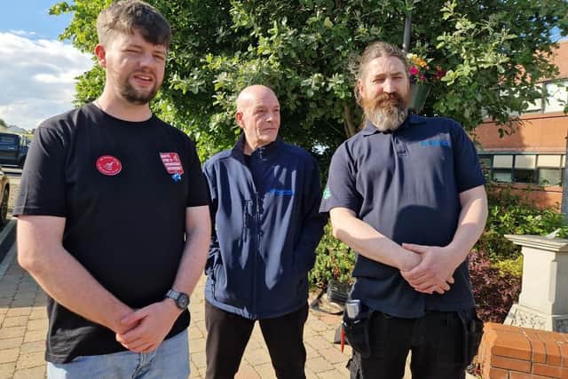 Unite the Union Regional Officer Neil Moore with Glen Dimplex workers and Unite representatives David Holbeach and Paul Guthrie who spoke about workers' anxiety and concern at the possible closure of the Portadown factory ahead of an emergency meeting in Portadown.