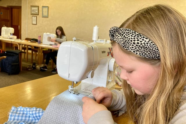 Young people taking part in a sewing class at Stitching Time in Ballycastle. Credit National Lottery