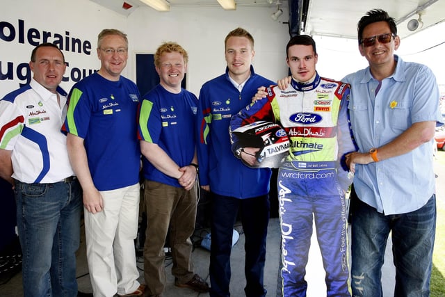 Tony Stewart, Dermot Rafferty, Roy Dixon, and Alan Simpson pictured with former World Champion Jari-Matti Latcala during the Ford Fair at the Dunluce Centre back in 2009