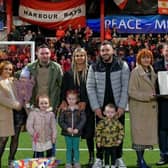 Lyn Kernohan was joined by loved ones on the Inver Park pitch ahead of Larne's derby clash with Carrick on September 22. (Pic: Larne FC).