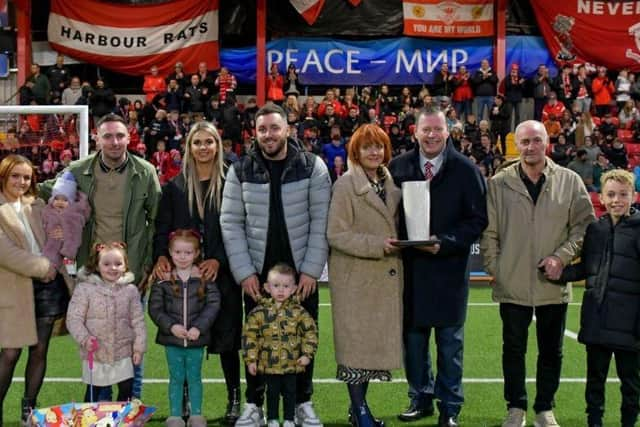 Lyn Kernohan was joined by loved ones on the Inver Park pitch ahead of Larne's derby clash with Carrick on September 22. (Pic: Larne FC).