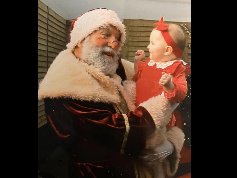 Charlotte meeting Santa.