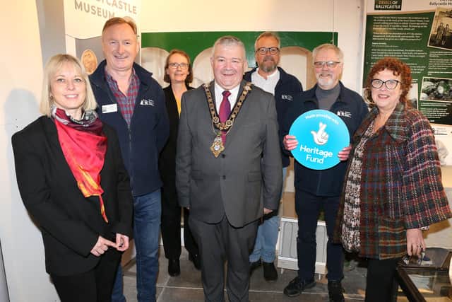 The Mayor of the Causeway Coast and Glens, Cllr Ivor Wallace with Stella Byrne from The National Lottery Heritage Fund and members of the Friends of Ballycastle Museum.