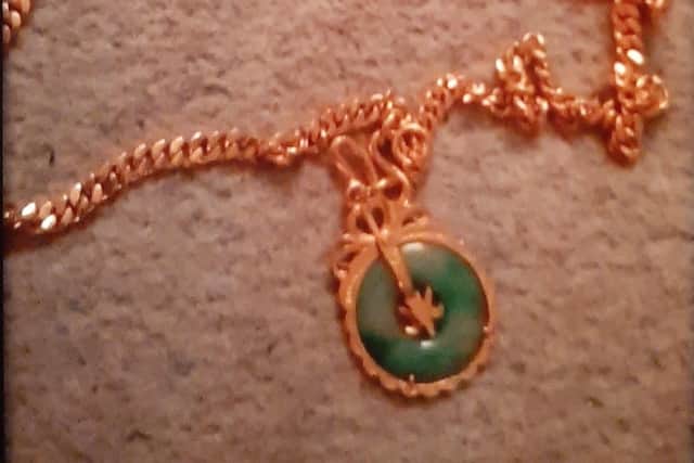 Police have appealed for information following the theft of a jade necklace when a house in Castlereagh was ransacked. Pic credit: PSNI