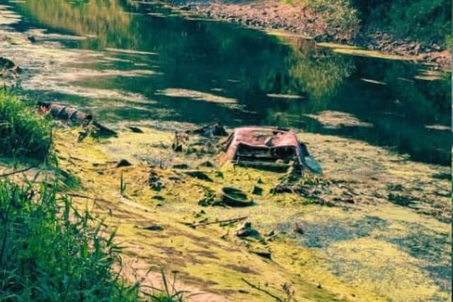 A car that has been in the River Lagan in Lisburn for years. Pic credit: Green Party Northern Ireland