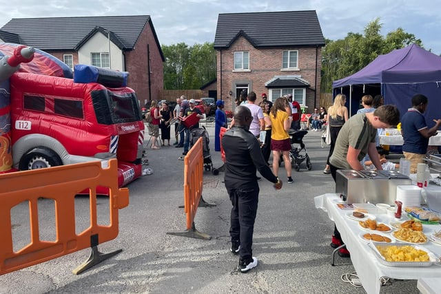A Portadown estate complex hosted a multi-cultural street party with food, music and fun from across the globe.