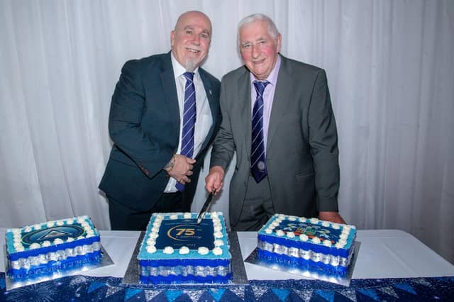Cutting the celebration cake at the Glenavon Triangle Supporters Club 75th anniversary dinner are, Triangle Club Chairman, Graham Morwood, left, and longest serving club member, Bobby Archer who joined in 1961. LM22-237.