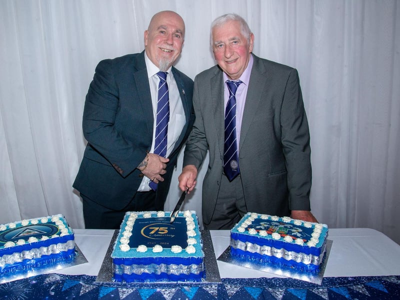 Cutting the celebration cake at the Glenavon Triangle Supporters Club 75th anniversary dinner are, Triangle Club Chairman, Graham Morwood, left, and longest serving club member, Bobby Archer who joined in 1961. LM22-237.