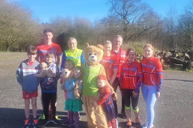 Teddy Bear runner Susan O'Neill is pictured with friends and fellow runners.