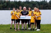 Loughmacrory Handball champions with Power NI employee and Handball coach, Kenny Curran.