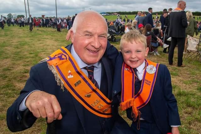 Proud grandad John Russell poses with his grandson Louis Lamont (5) at Killylea on the 12th in 2024. Picture: Tony Hendron