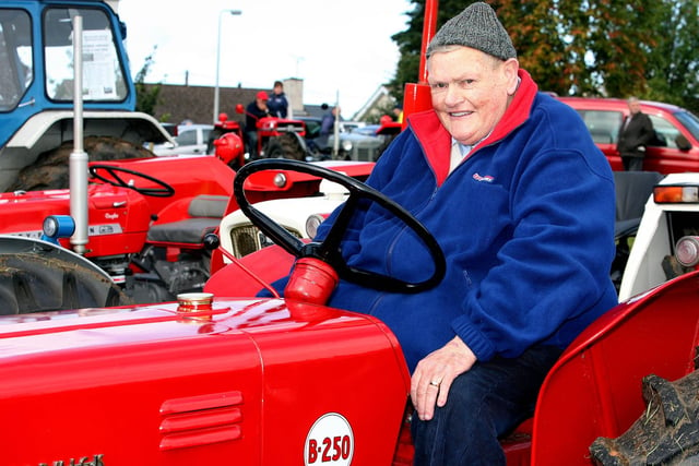 PRIDE AND JOY...Jackie Hunter from Aghadowey pictured with his tractor during the Garvagh Clydesdale and Vintage Show in 2008