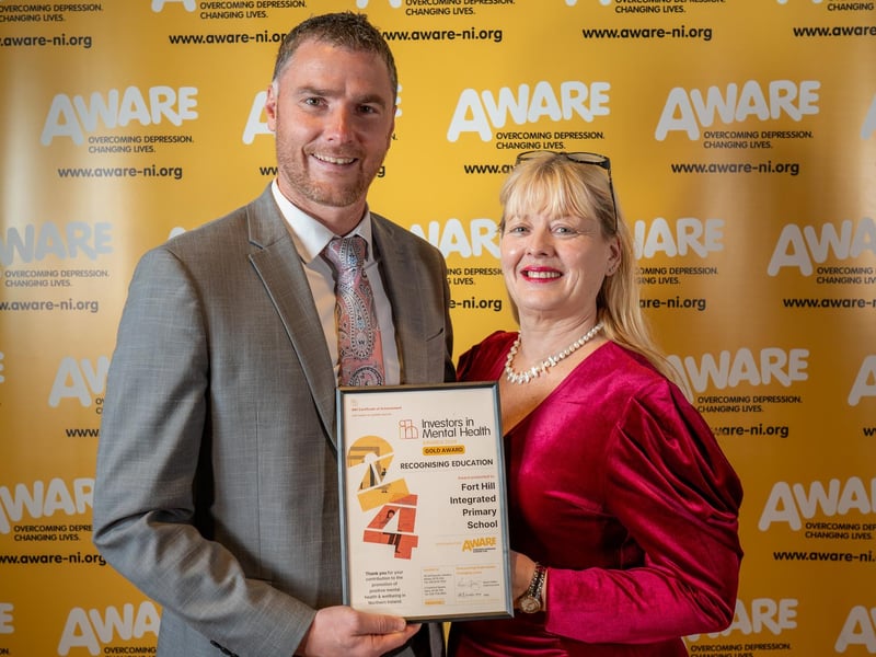 Staff from Fort Hill Integrated Primary collect their award after the Lisburn-based school was recognised for their dedication to promoting positive mental health. The school has integrated AWARE NI’s mental health programme such as My Mind and Me into their curriculum and also maintained a consistent focus on mental health through initiatives like signposting, appointing mental health champions and creating dedicated mental health spaces through their outdoor garden.