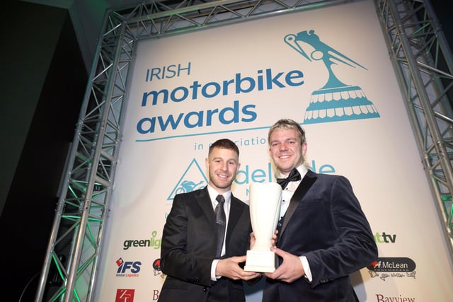 Jordan Scott receives the Monster Energy Off Road Rider of the Year award from Jonathan Rea.