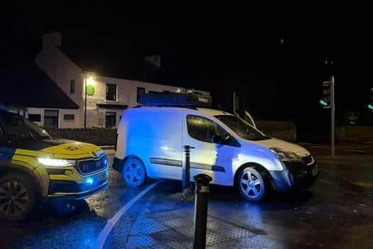 Police at the scene after a van mounted the kerb between pedestrian bollards in Greenisland. Photo provided by PSNI