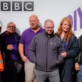 Liam Richards (third from left) and Michael Cummins (second from right) with the DIY SOS team