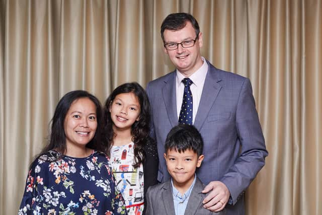 Pastor Paul, his wife Cheryl and their children, Sarah and Samuel.