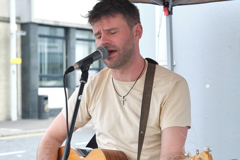 One of the musicians pictured performing at the Town Centre event in Magherafelt.