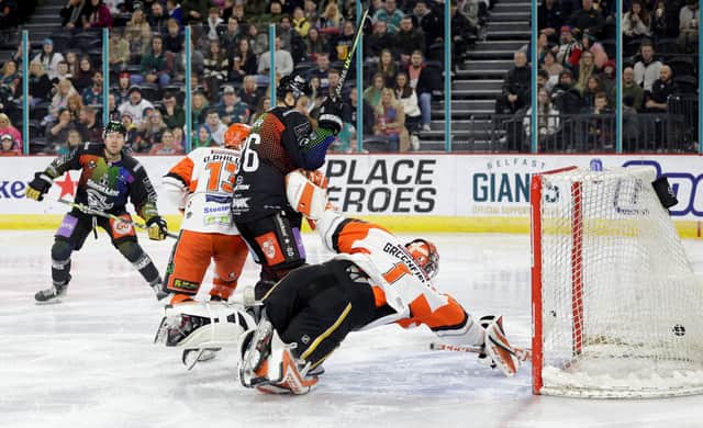 Belfast Giants' Scott Conway scoring against Sheffield Steelers during Friday’s Elite Ice Hockey League game at the SSE Arena, Belfast.   Photo by William Cherry/Presseye