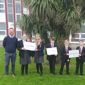 Mr Maxwell and Mr Roberts with Carrickfergus Grammar School pupils launching the initiative. Picture: Carrickfergus GS.