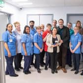 Ciaran Hinds with staff on Ward 3 at Whiteabbey Hospital.