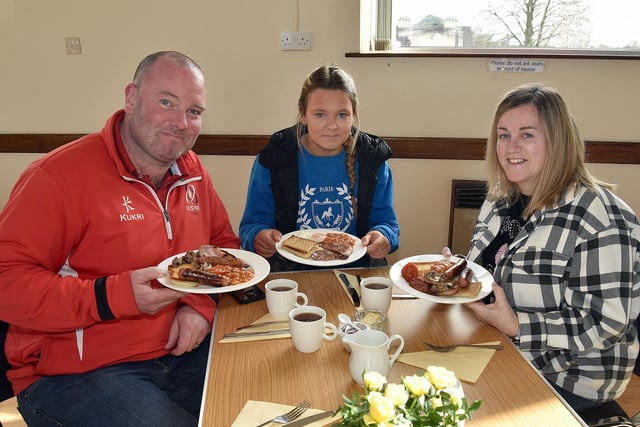 The Stewart family prepare to tackle the Loughgall Parish Big Breakfast on Saturday morning. Included are Alastair, Megan and Sandra. PT13-206.