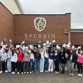 Students at Sperrin Integrated College in Magherafelt celebrating their GCSE results on Thursday.