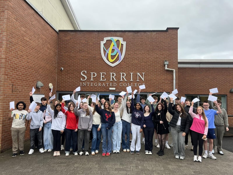 Students at Sperrin Integrated College in Magherafelt celebrating their GCSE results on Thursday.