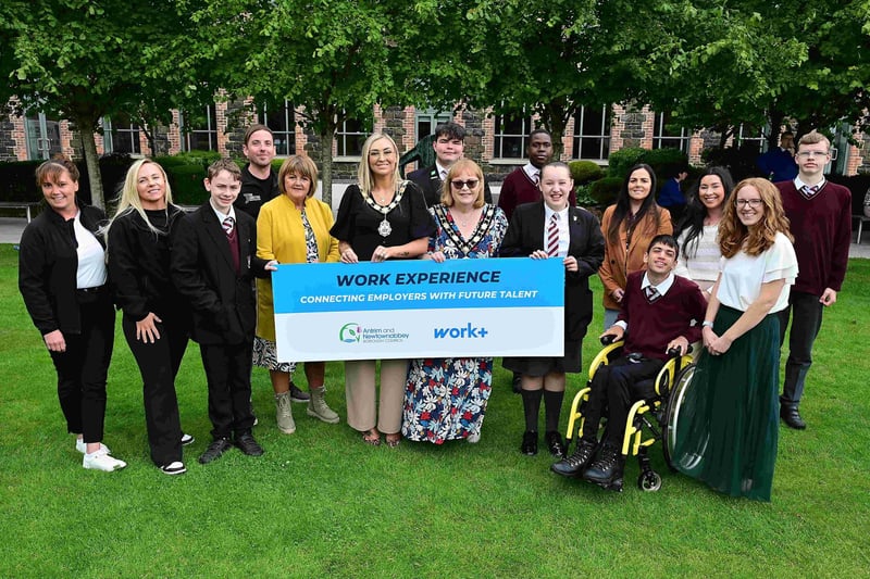 : Mayor or Antrim and Newtownabbey, Councillor Leah Kirkpatrick, and Deputy Mayor Councillor Julie Gilmour, with pupils from Rosstulla Special School and work placement providers, The Junction Antrim, Starbucks and CDE Global.