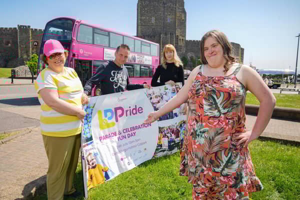 Celebrating the new partnership between Translink and Learning Disability Pride are, from left, Joanna McCosh, Thomas Haighton, Learning Disability Pride organiser; Danielle Campbell, Translink accessibility manager and Anna Louise Scott.  Photo by Aaron McCracken